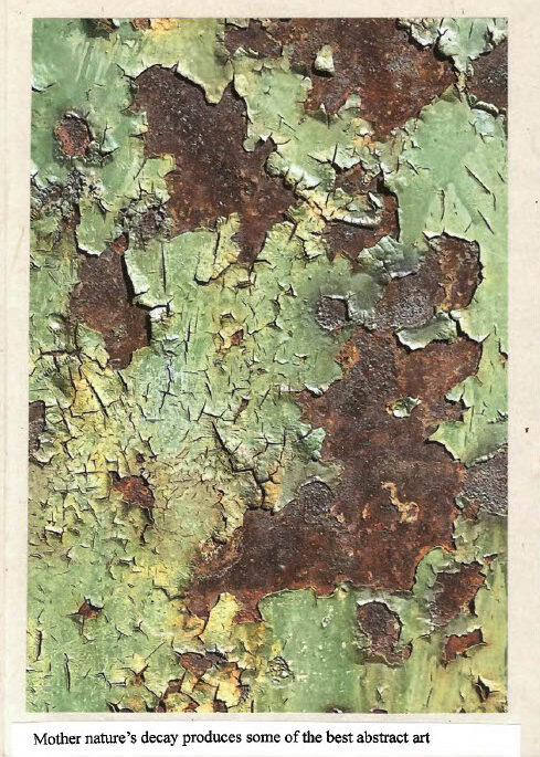 Close‑up photograph of a weathered, peeling surface in green, brown, and yellow tones, with handwritten text reading: ‘Mother nature’s decay produces some of the best abstract art.’